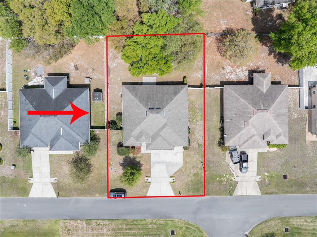 5273 Southwest 96th Place Ocala, FL 34476 - Photo 4 of 55 an aerial view of a house with a yard