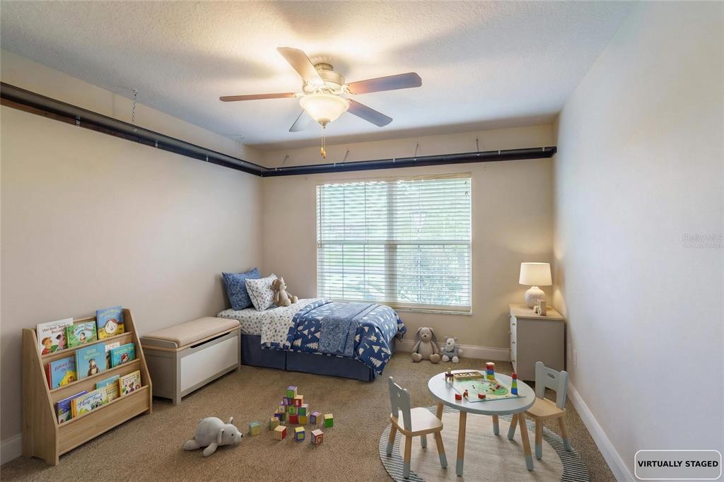 5273 Southwest 96th Place Ocala, FL 34476 - Photo 42 of 55 a living room with furniture and a window