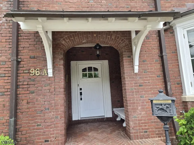 a front view of a house with entrance