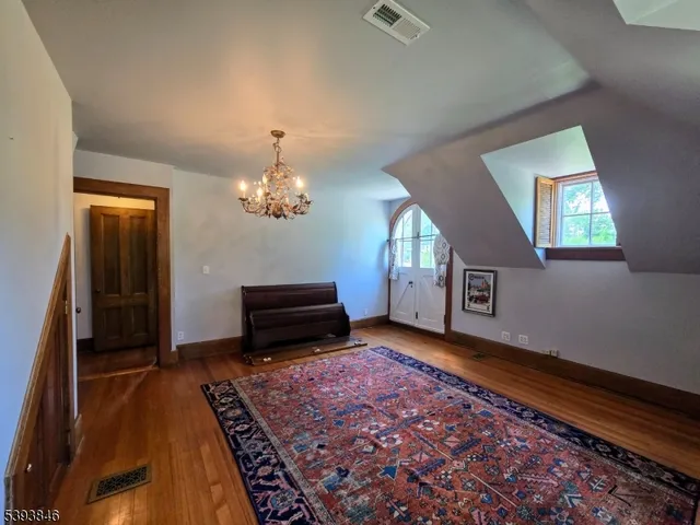 a living room with a rug
