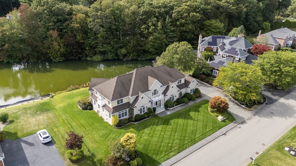 19 Cherokee Road Canton, MA 02021 - Photo 35 of 42 an aerial view of a house with swimming pool and garden