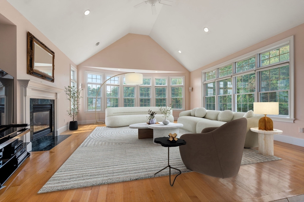 19 Cherokee Road Canton, MA 02021 - Photo 6 of 42 a living room with fireplace furniture and a large window