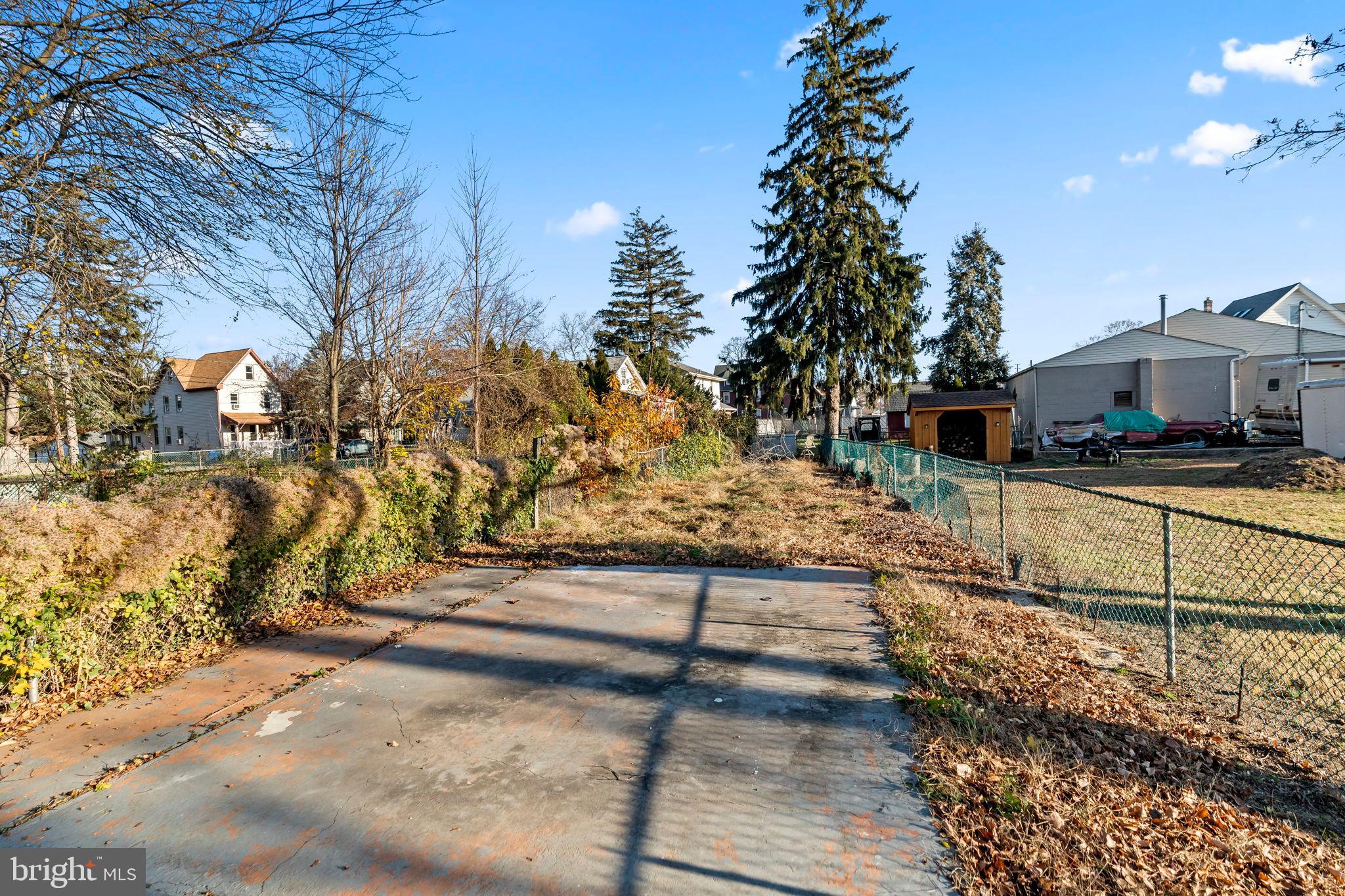 606 Spruce Street Delanco, NJ 08075 - Photo 28 of 29 a view of a yard with wooden fence