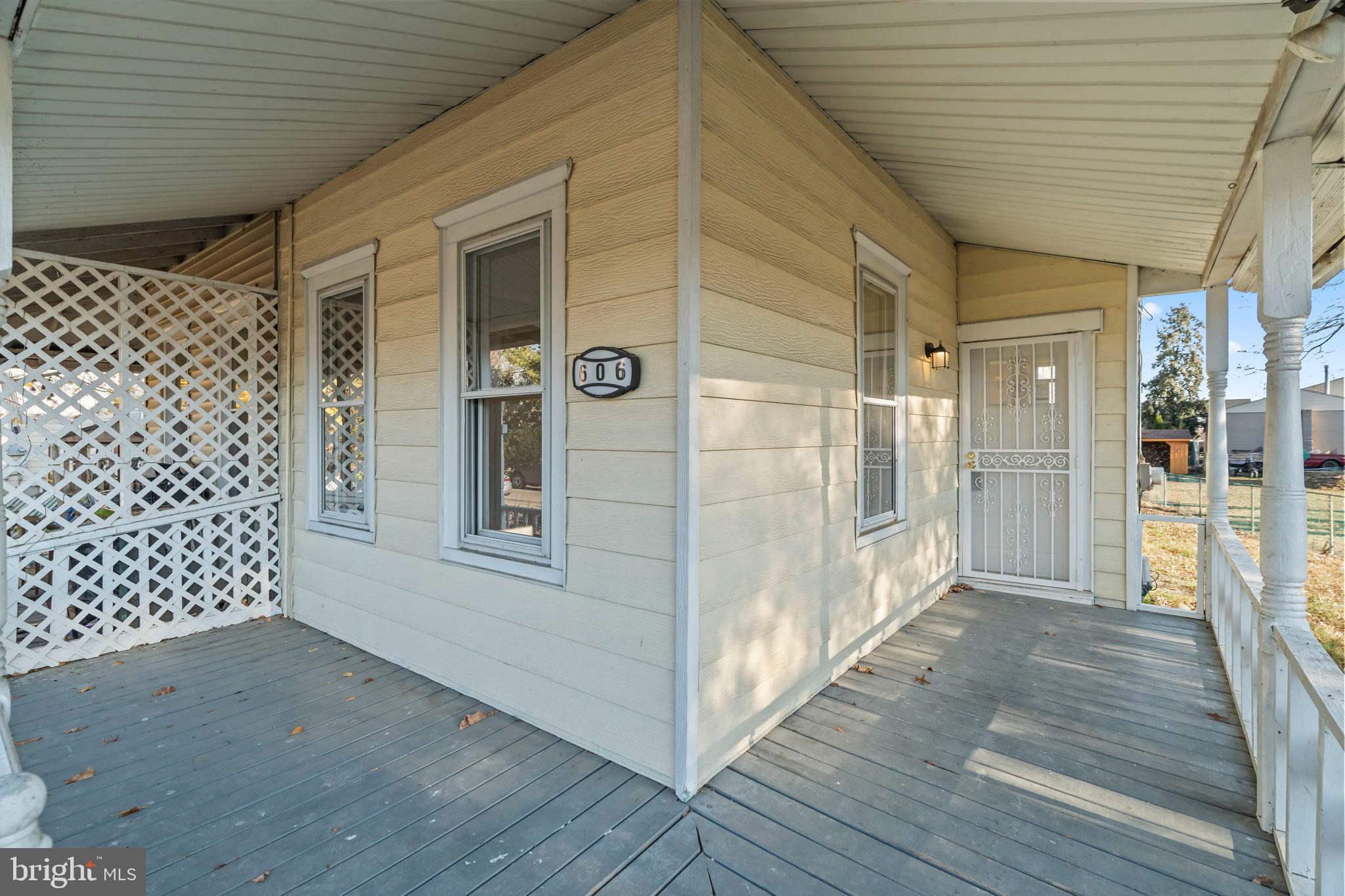 606 Spruce Street Delanco, NJ 08075 - Photo 4 of 29 a view of a porch with wooden floor