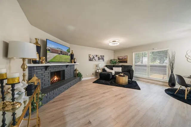 a bed room with furniture and a fireplace