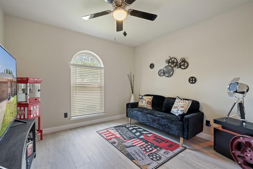 622 Roaming Rd Drive Allen, TX 75002 - Photo 19 of 27 a living room with furniture and a window