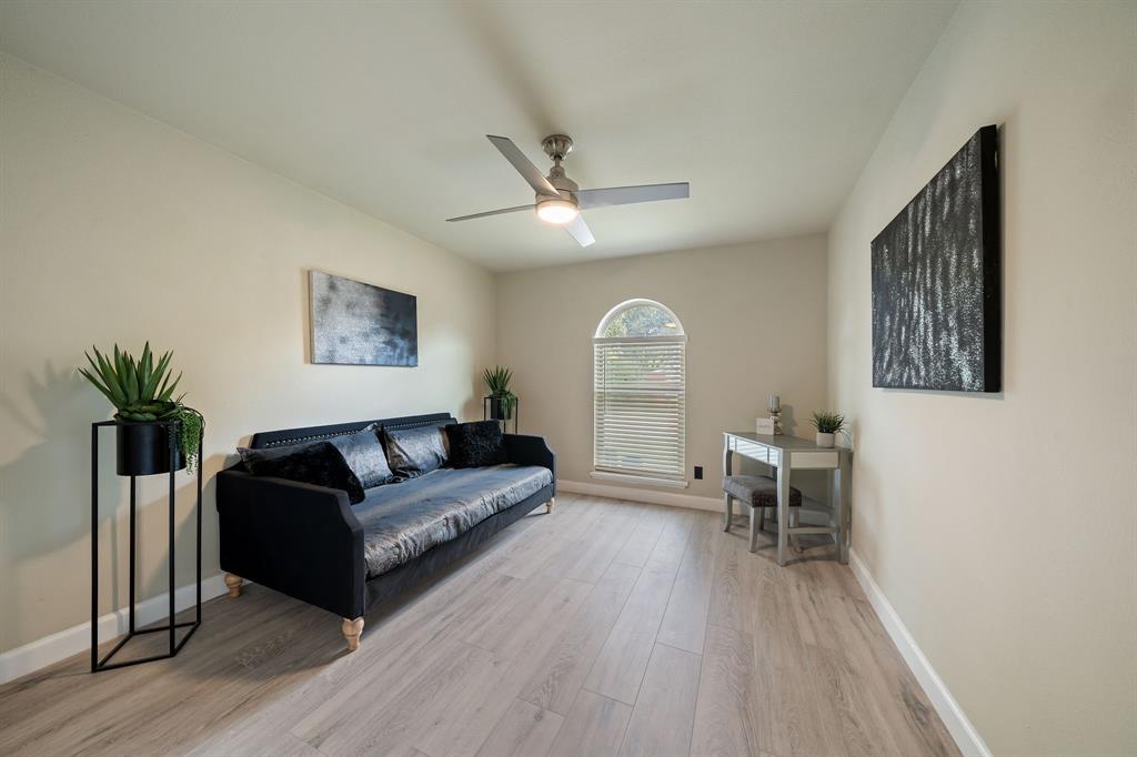 622 Roaming Rd Drive Allen, TX 75002 - Photo 23 of 27 a living room with furniture and a window