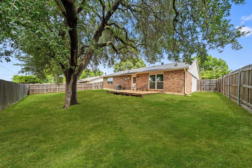 622 Roaming Rd Drive Allen, TX 75002 - Photo 26 of 27 a front view of house with yard and green space