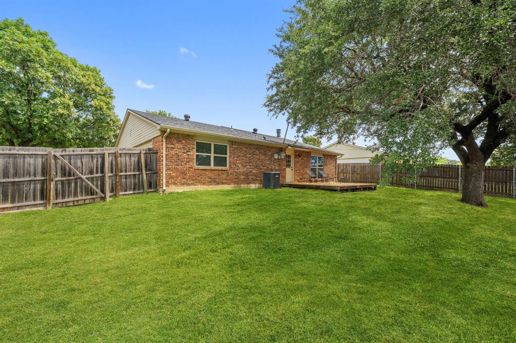 622 Roaming Rd Drive Allen, TX 75002 - Photo 27 of 27 a front view of house with yard and green space