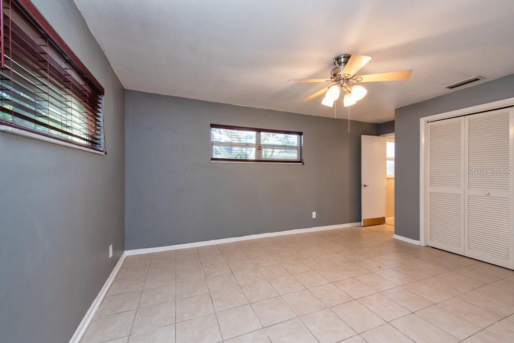 1877 Dawn Drive Clearwater, FL 33763 - Photo 11 of 36 a view of an empty room with a window