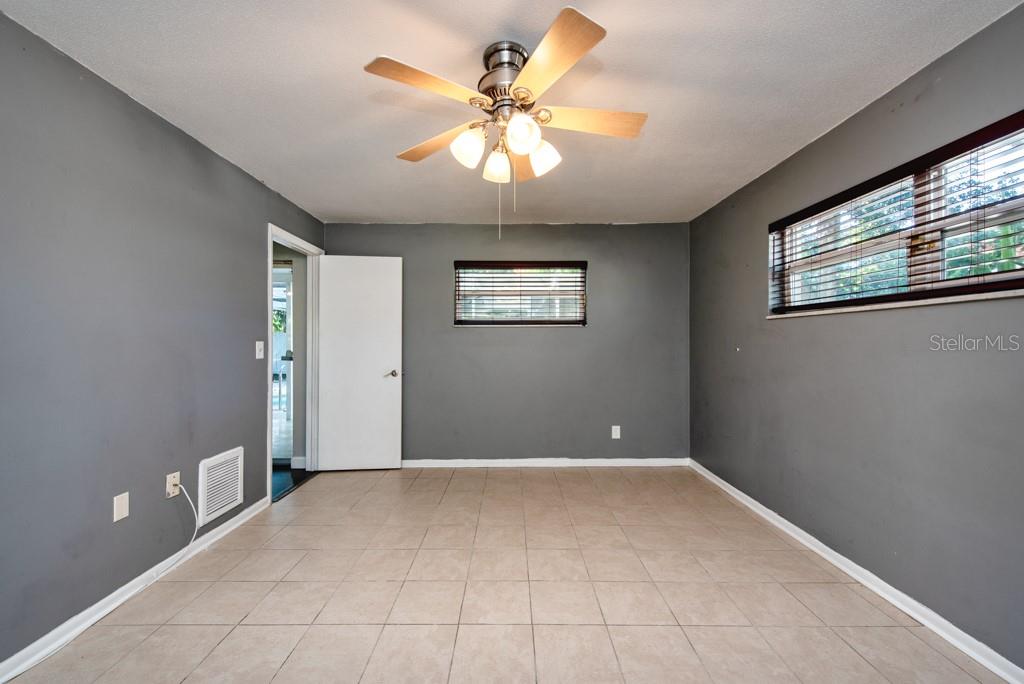 1877 Dawn Drive Clearwater, FL 33763 - Photo 13 of 36 a view of an empty room with a window