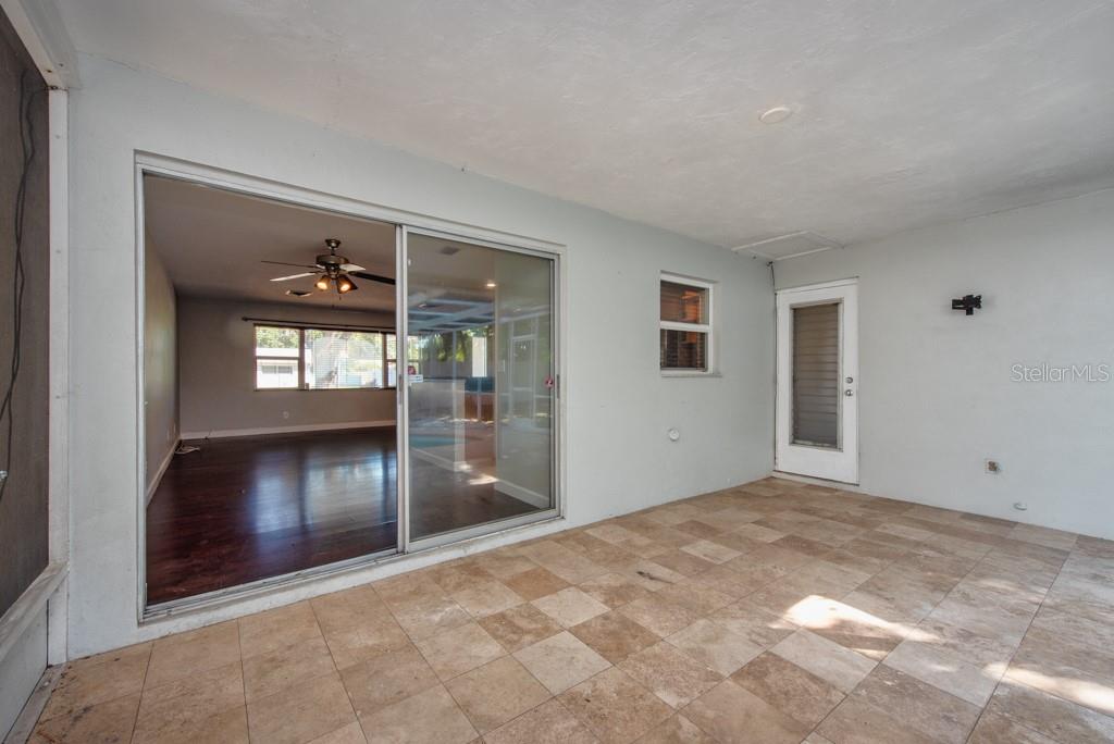 1877 Dawn Drive Clearwater, FL 33763 - Photo 22 of 36 a view of an empty room and window
