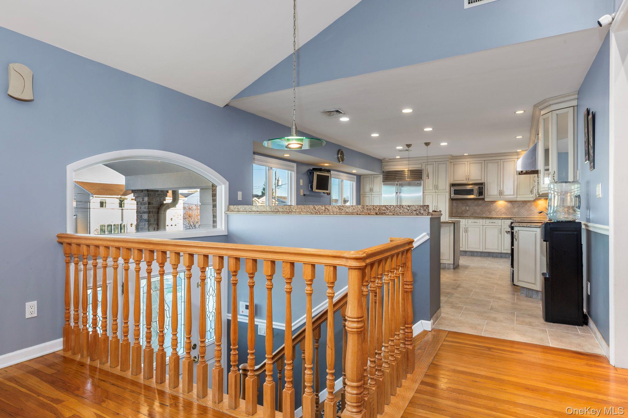2770 Mandalay Beach Road Wantagh, NY 11793 - Photo 4 of 27 a view of a kitchen with furniture and wooden floor