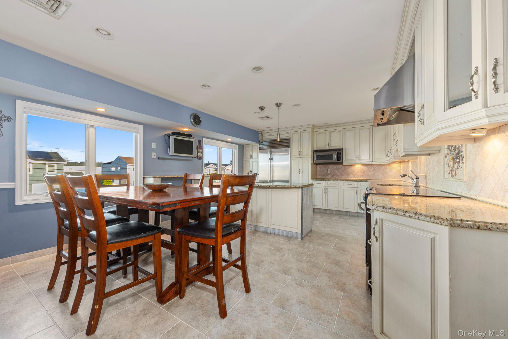 2770 Mandalay Beach Road Wantagh, NY 11793 - Photo 5 of 27 a view of a dining room kitchen and a window