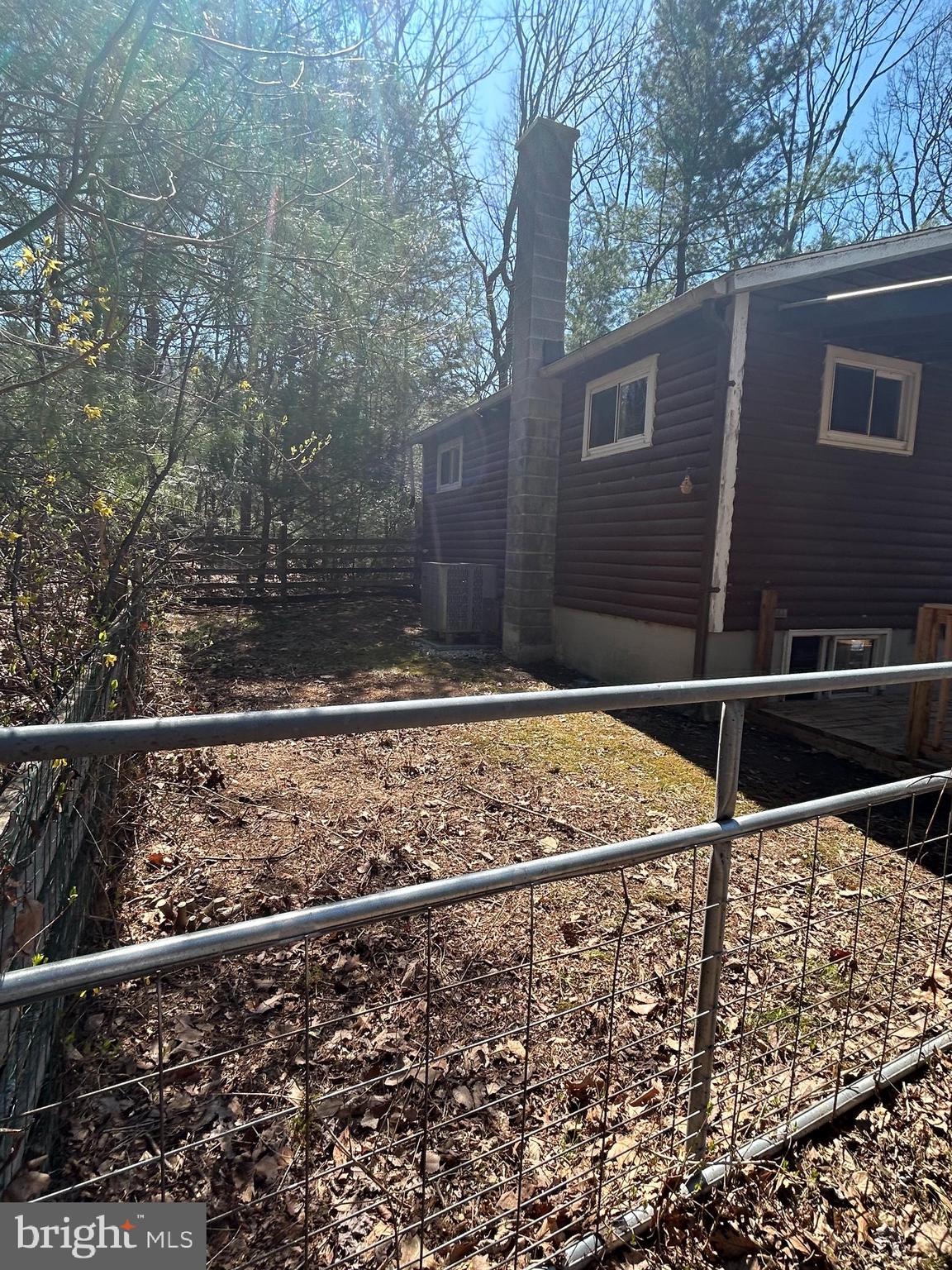 923 Dever Hollow Road Millerstown, PA 17062 - Photo 11 of 12 a backyard of a house with lots of green space