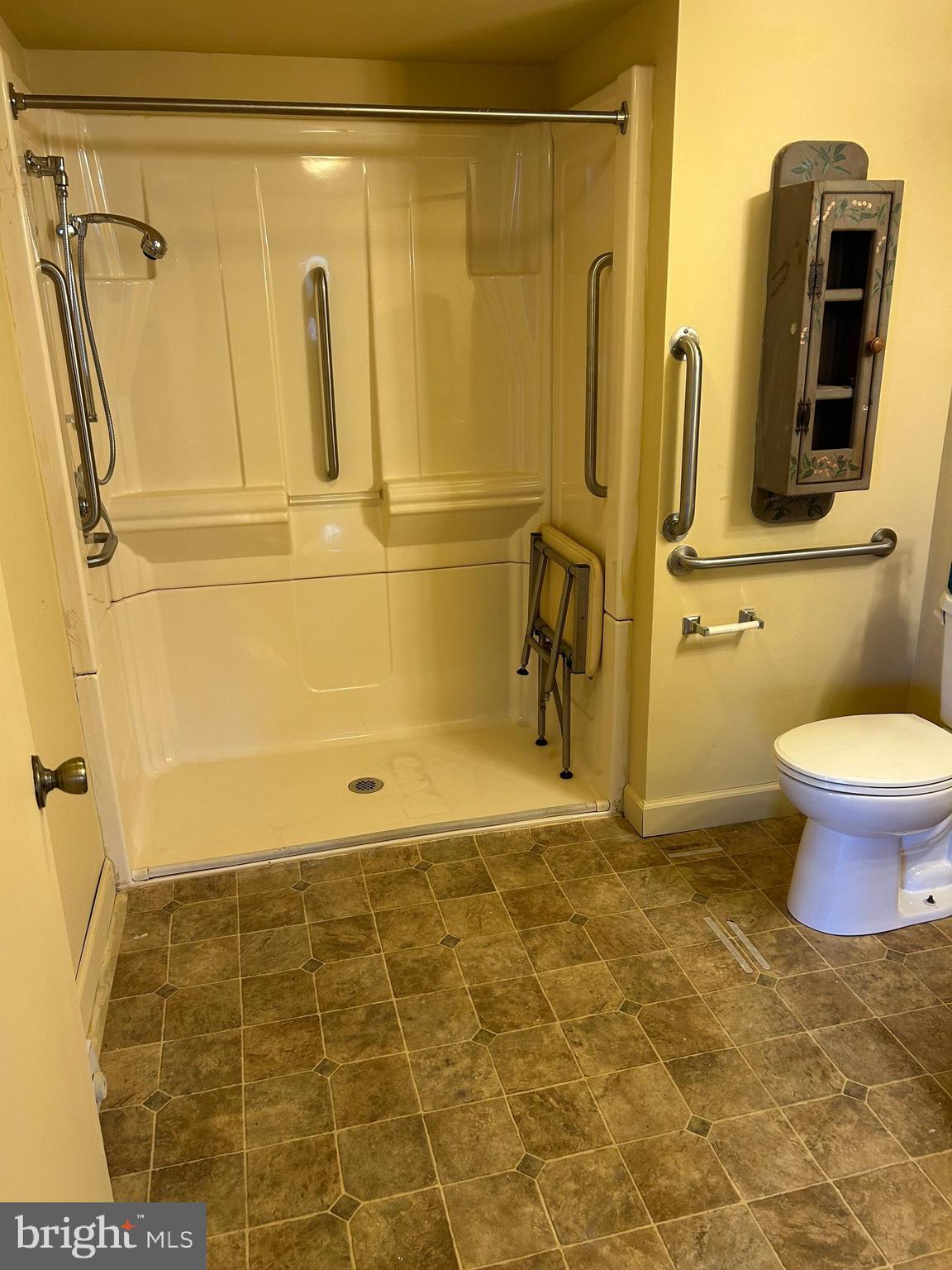 923 Dever Hollow Road Millerstown, PA 17062 - Photo 6 of 12 a bathroom with a shower and a toilet