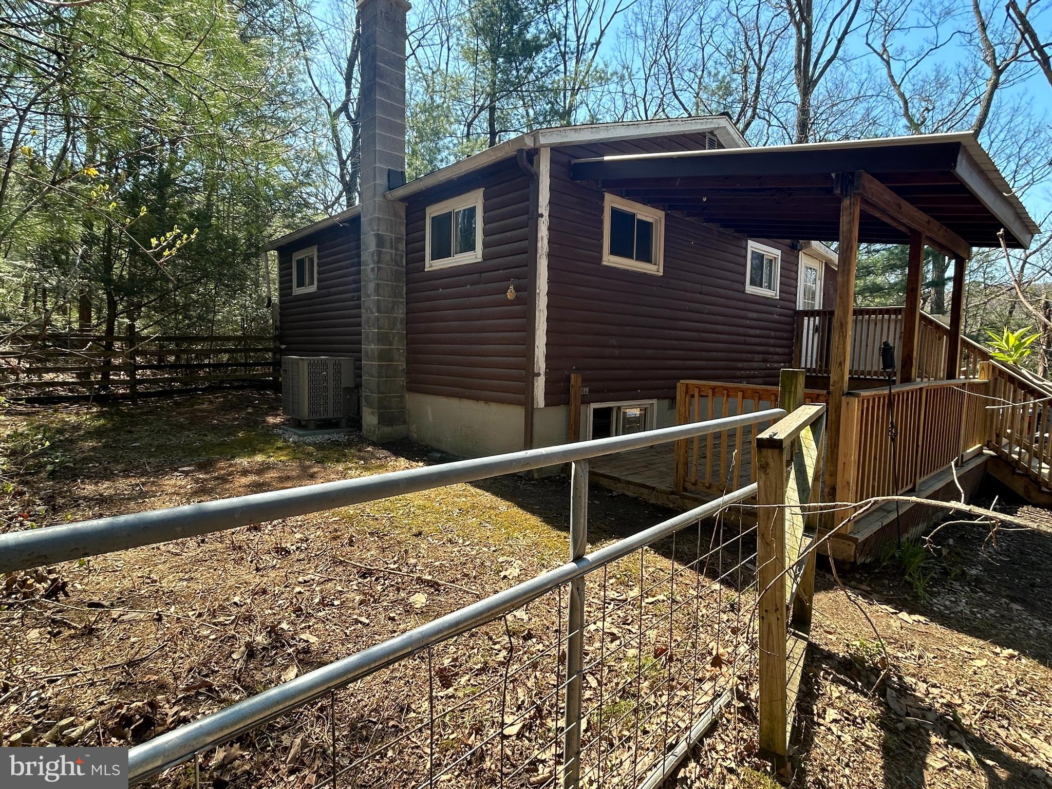 923 Dever Hollow Road Millerstown, PA 17062 - Photo 10 of 12 a view of backyard with large tree and wooden fence