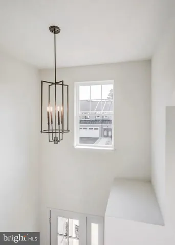 a view of empty room with windows