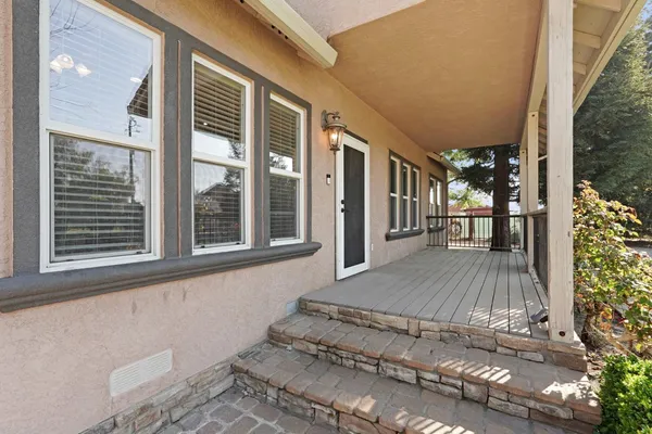 a view of a house with a porch