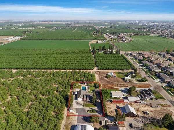 an aerial view of a city with lots of residential buildings