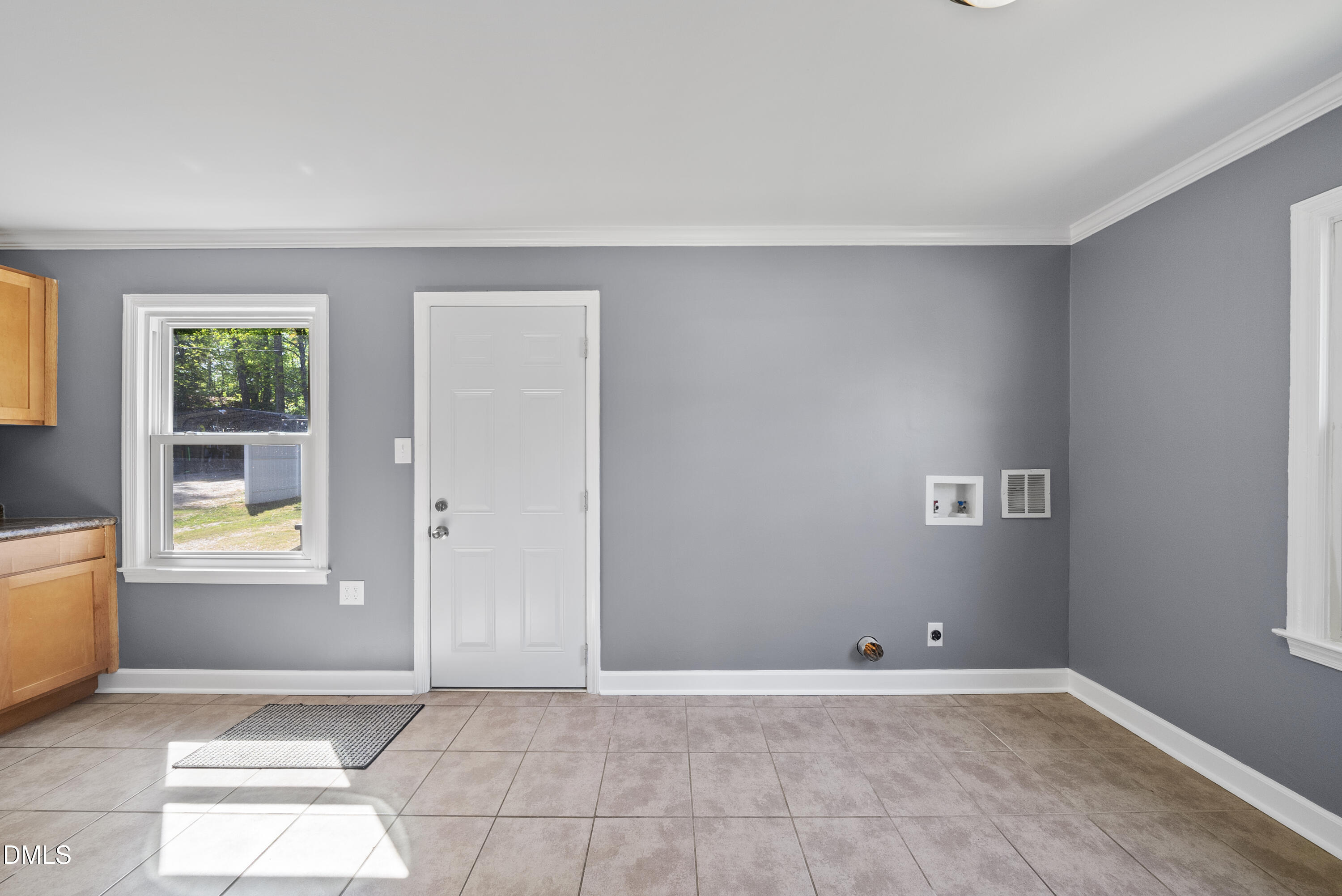 2810 Newbold Street Raleigh, NC 27603 - Photo 16 of 30 an empty room with windows
