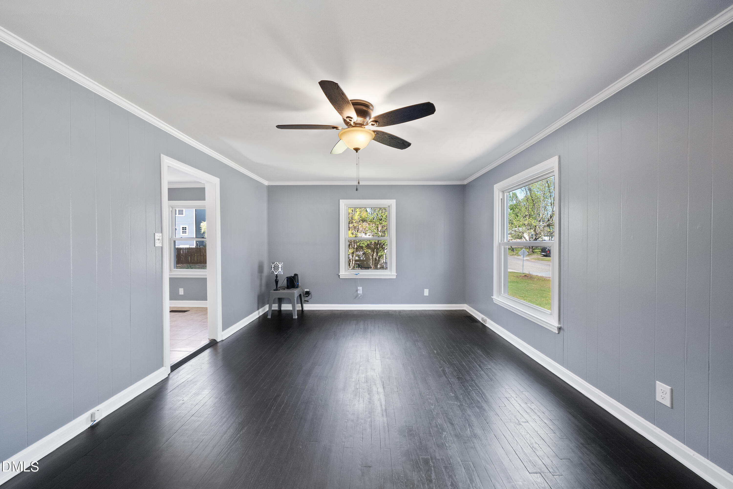 2810 Newbold Street Raleigh, NC 27603 - Photo 22 of 30 an empty room with wooden floor and windows