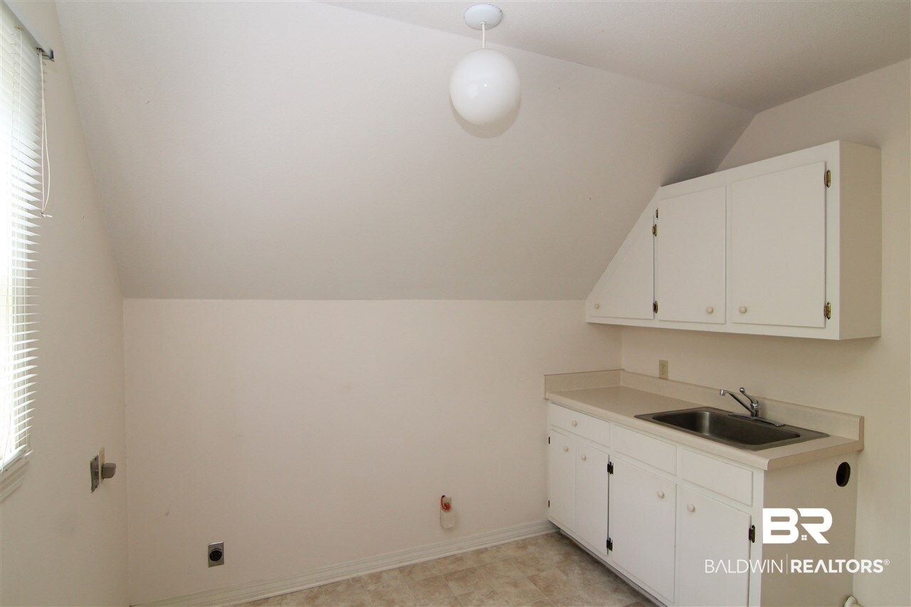 7147 Chapman Street Fairhope, AL 36532 - Photo 30 of 48 Upstairs Laundry