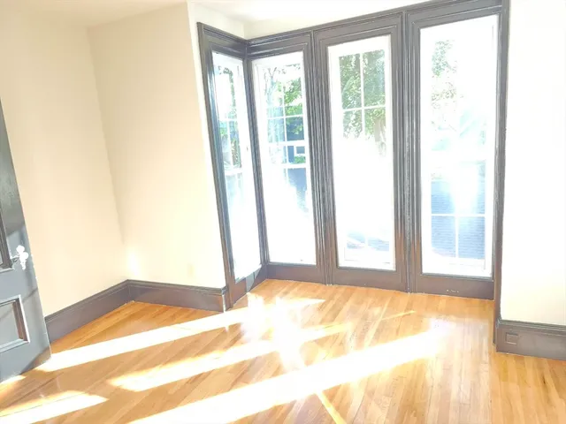 a view of an empty room and window