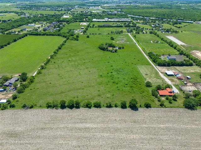 a view of a garden with a lake