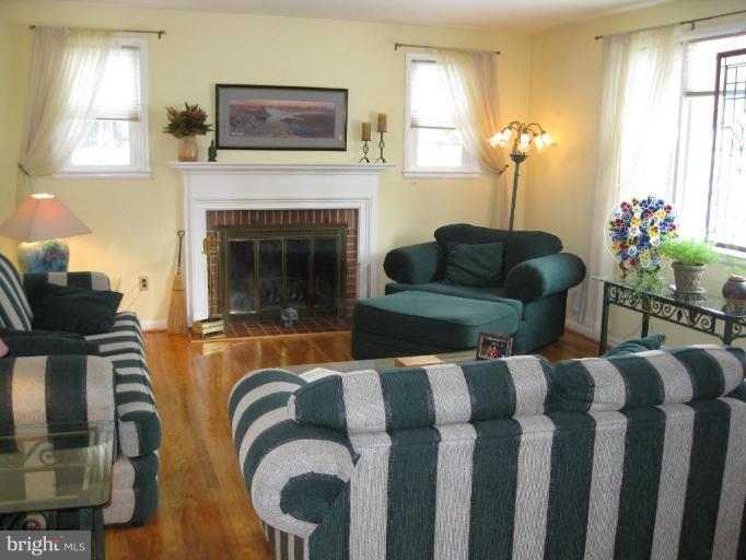 1204 Edgemont Road Towson, MD 21286 - Photo 8 of 25 GORGEOUS FIREPLACE & GLEAMING HARDWOODS!!