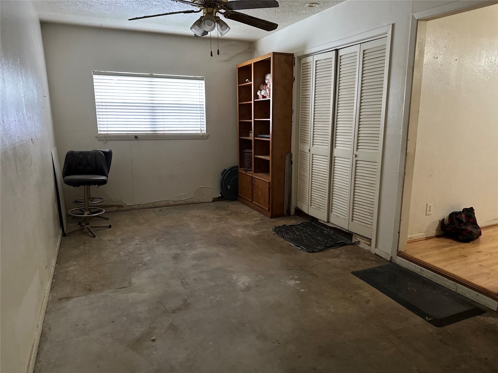 1001 Red Bud Street Channelview, TX 77530 - Photo 11 of 21 a view of a livingroom with workspace and a window