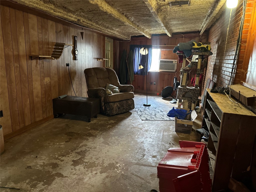 1001 Red Bud Street Channelview, TX 77530 - Photo 12 of 21 a living room with furniture a flat screen tv and a window