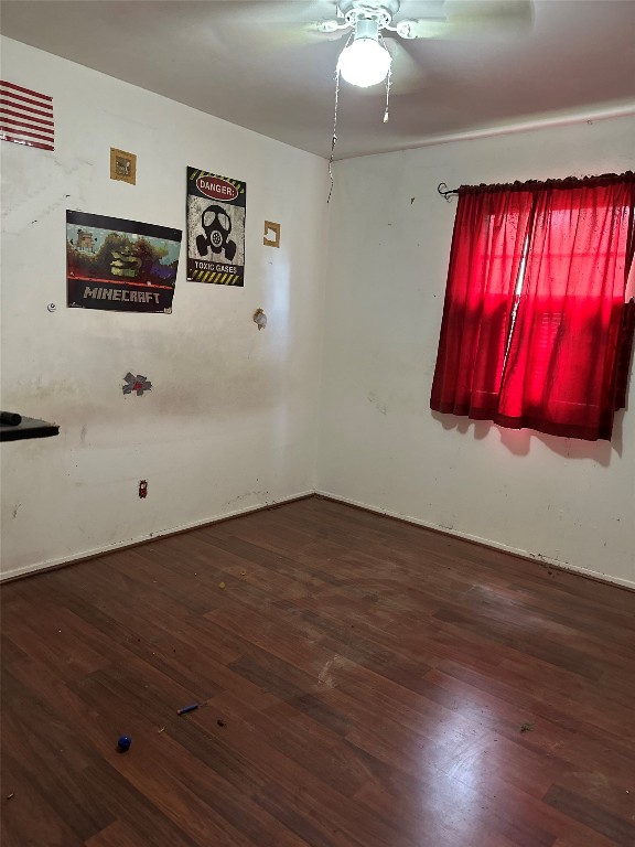 1001 Red Bud Street Channelview, TX 77530 - Photo 16 of 21 a view of a room with wooden floor and window