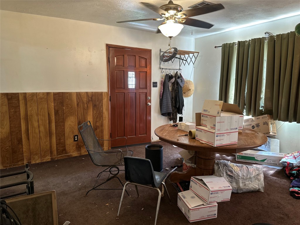 1001 Red Bud Street Channelview, TX 77530 - Photo 4 of 21 a view of a dining room with furniture and a chandelier