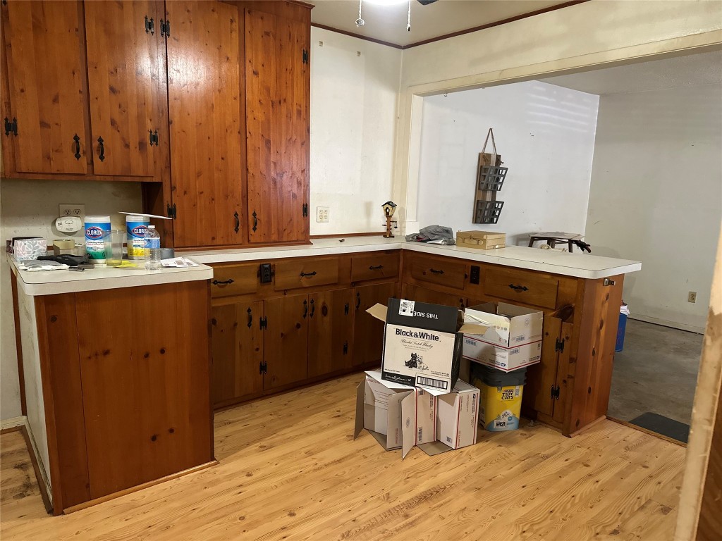 1001 Red Bud Street Channelview, TX 77530 - Photo 10 of 21 a kitchen with a sink stove and cabinets