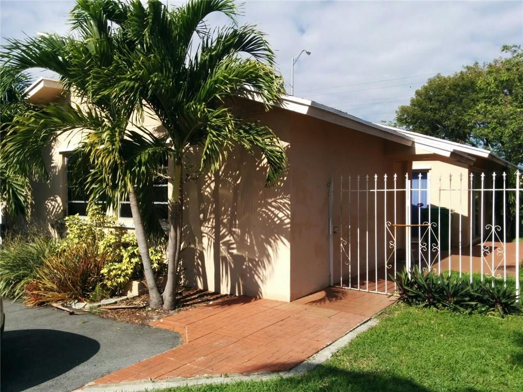 11229 Southwest 152nd Terrace Miami, FL 33157 - Photo 1 of 26 a view of a house with a yard and plants