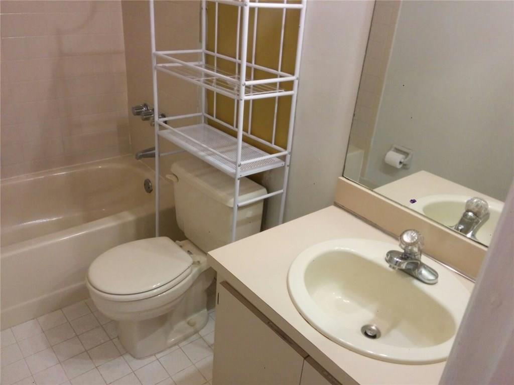 11229 Southwest 152nd Terrace Miami, FL 33157 - Photo 15 of 26 a bathroom with a sink toilet and shower