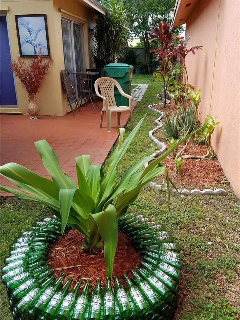 11229 Southwest 152nd Terrace Miami, FL 33157 - Photo 25 of 26 a backyard of a house with lots of green space