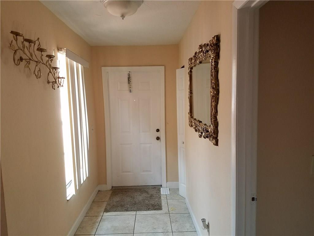 11229 Southwest 152nd Terrace Miami, FL 33157 - Photo 5 of 26 a view of a bathroom from a hallway