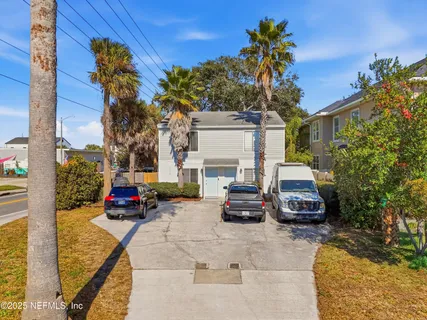 a car parked in front of a house