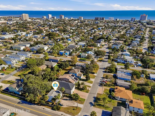 an aerial view of a building with street view