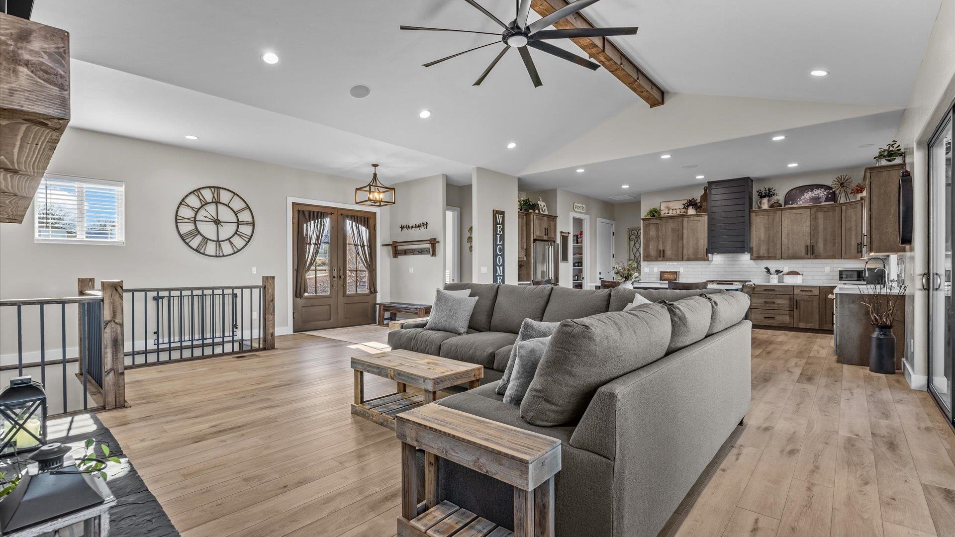 1774 Trapper Court Delta, CO 81416 - Photo 13 of 42 a living room with furniture and a wooden floor