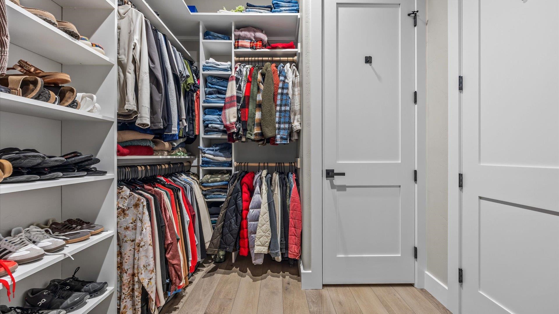 1774 Trapper Court Delta, CO 81416 - Photo 17 of 42 a view of walk in closet with clothes and shoes