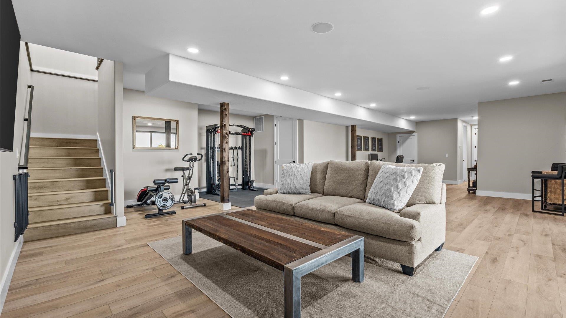 1774 Trapper Court Delta, CO 81416 - Photo 23 of 42 a living room with furniture and a wooden floor