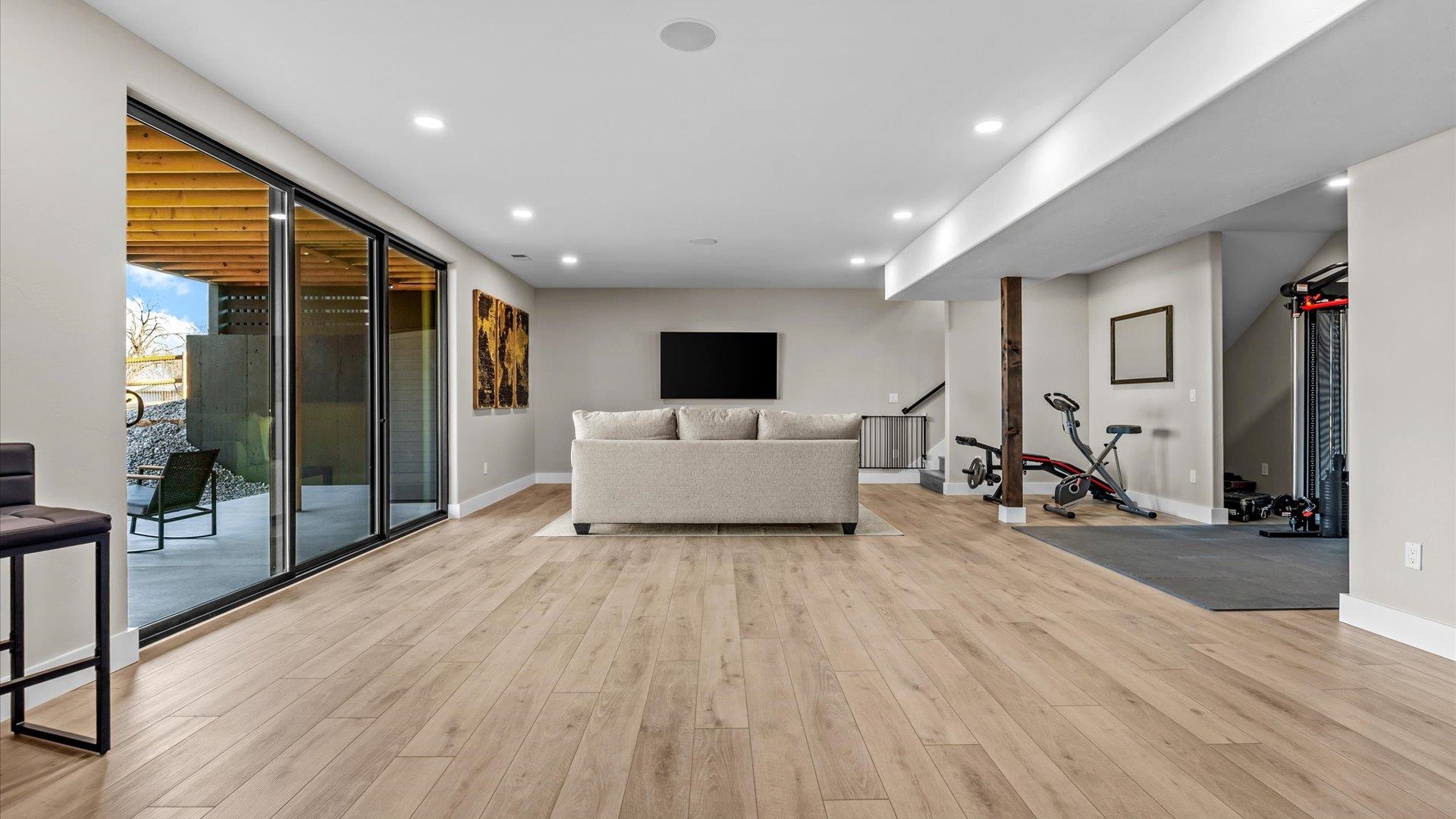 1774 Trapper Court Delta, CO 81416 - Photo 24 of 42 a view of a livingroom with furniture and a flat screen tv