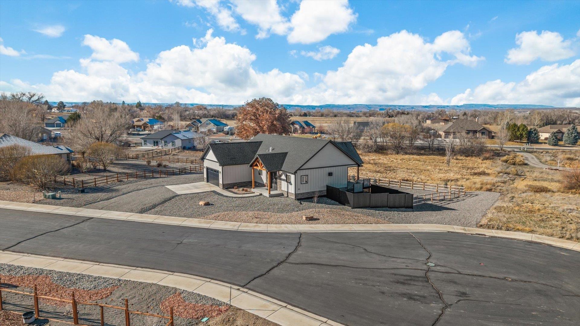1774 Trapper Court Delta, CO 81416 - Photo 32 of 42 a view of a terrace with wooden fence
