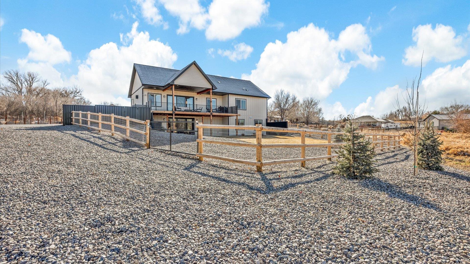 1774 Trapper Court Delta, CO 81416 - Photo 33 of 42 a front view of a house with a yard