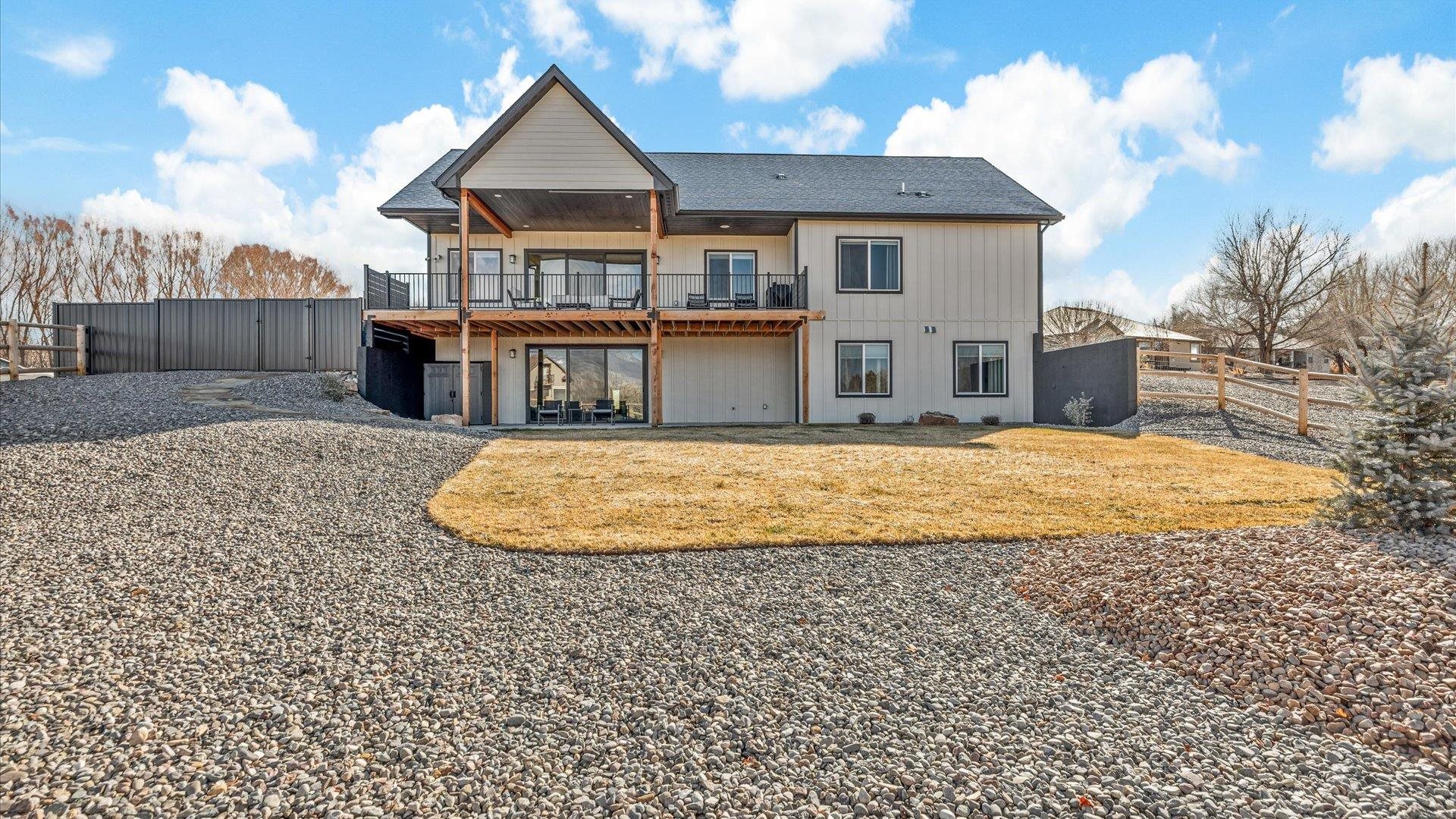 1774 Trapper Court Delta, CO 81416 - Photo 35 of 42 a view of a house with a yard