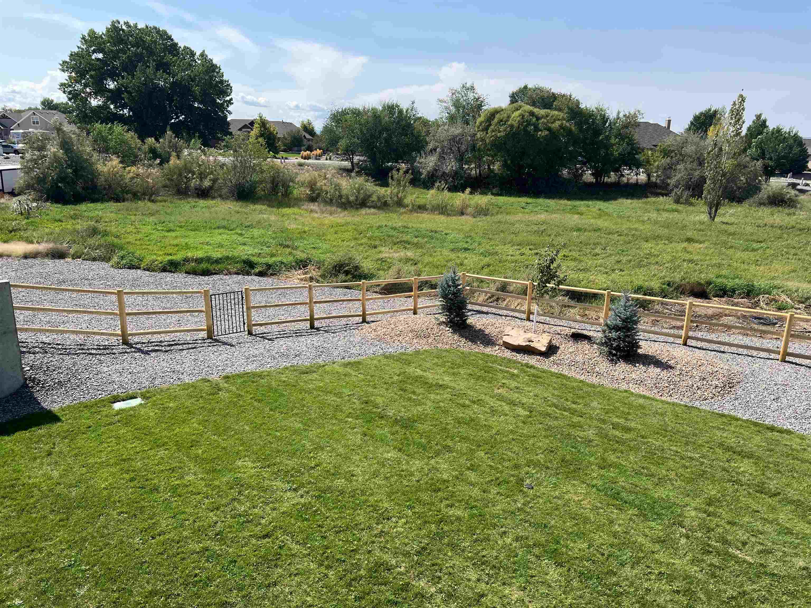 1774 Trapper Court Delta, CO 81416 - Photo 37 of 42 a view of a garden with an outdoor space