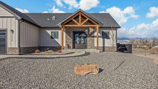 a kitchen with stainless steel appliances granite countertop a stove a sink dishwasher a refrigerator and a oven